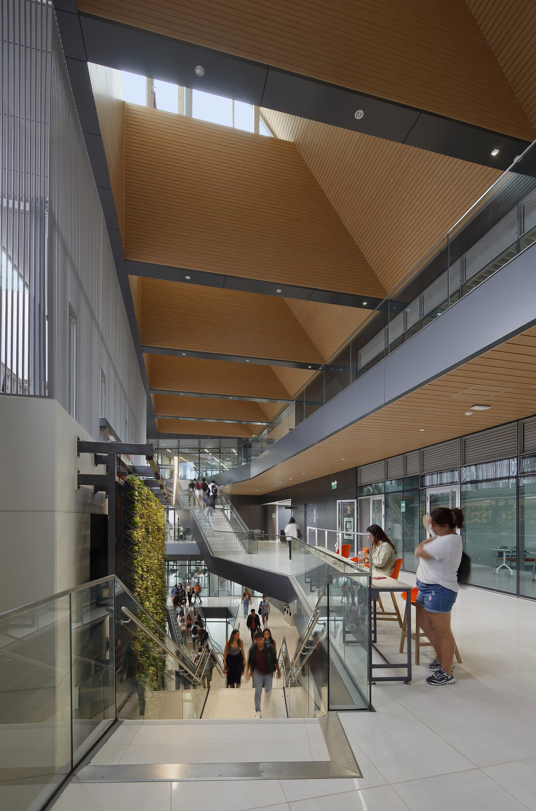 counter height seating along railing of engineering innovation center