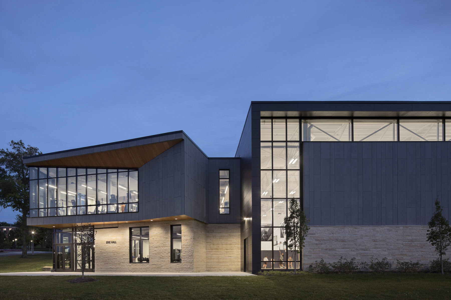 exterior photograph at dusk, detail of the northeast entry